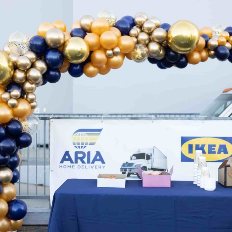 Aria Home Delivery and IKEA partnership launch event with balloon arch display