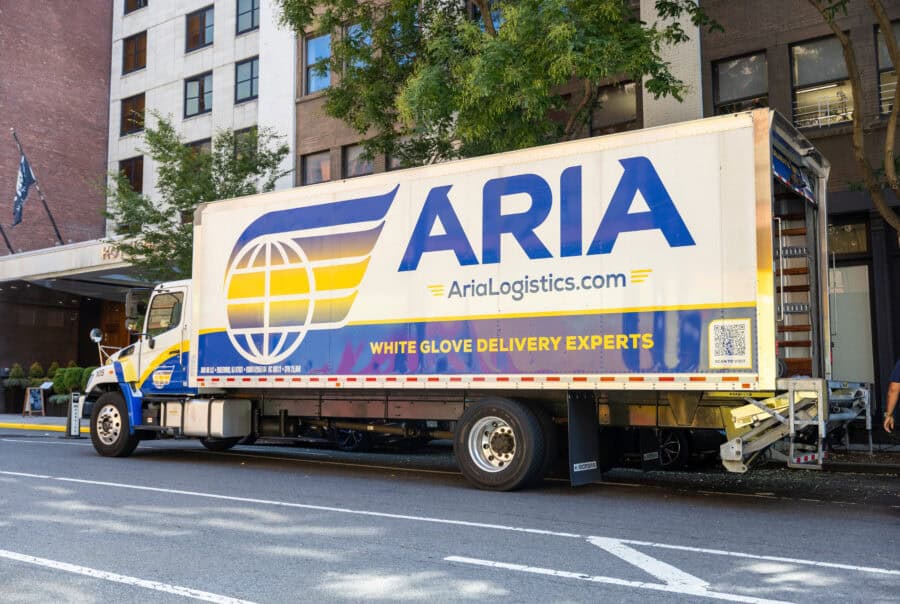 Aria Logistics white glove delivery truck on a New York City street